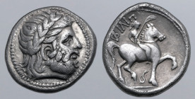 Celts in Eastern Europe AR Tetradrachm. Imitating Philip II of Macedon. Circa 2nd century BC. Laureate head of Zeus to right / ΦIΛIΠ, rider on horseba...