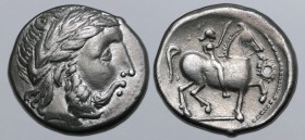 Celts in Eastern Europe AR Tetradrachm. Imitating Philip II of Macedon. Circa 2nd century BC. Laureate head of Zeus to right / Rider on horseback to r...