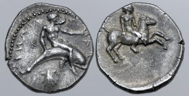 Calabria, Tarentum AR Nomos. 415-390 BC. TA[PANT]INΩN, Taras seated on dolphin swimming to right, holding akrostolion; K behind, shell below / Nude on...
