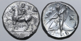 Calabria, Tarentum AR Nomos. Circa 240-228 BC. Xenokrates, magistrate. Reduced standard. Bearded strategos on horse walking to left, wearing short tun...