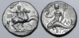 Calabria, Tarentum AR Nomos. Circa 240-228 BC. Kallikrates, magistrate. Reduced standard. Strategos, holding Nike who crowns him in extended right han...