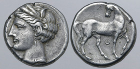 North Africa, Carthage AR 2/3 Shekel. Circa 300 BC. Head of Tanit-Persephone to left, wearing wreath of barley ears, single pendant earring and neckla...