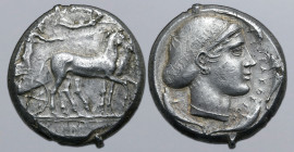 Sicily, Syracuse AR Tetradrachm. Time of the Second Democracy, circa 440-430 BC. Unsigned dies by the master ‘A’. Charioteer, holding kentron and rein...