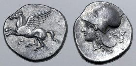 Corinthia, Corinth AR Stater. Circa 405-345 BC. Pegasos flying to left; Ϙ below / Head of Athena to left, wearing Corinthian helmet; palmette behind. ...