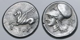 Corinthia, Corinth AR Stater. Circa 345-307 BC. Pegasos flying to left; Ϙ below / Head of Athena to left, wearing Corinthian helmet; N within wreath b...