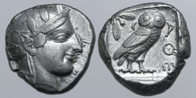 Attica, Athens AR Tetradrachm. Circa 460-454 BC. Late “transitional” issue. Head of Athena to right, wearing crested Attic helmet ornamented with thre...