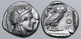 Attica, Athens AR Tetradrachm. Circa 454-404 BC. Head of Athena to right, wearing crested Attic helmet ornamented with three olive leaves above visor ...