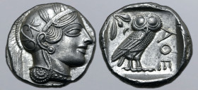 Attica, Athens AR Tetradrachm. Circa 454-404 BC. Head of Athena to right, wearing crested Attic helmet ornamented with three olive leaves above visor ...