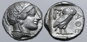 Attica, Athens AR Tetradrachm. Circa 454-404 BC. Head of Athena to right, wearing crested Attic helmet ornamented with three olive leaves above visor ...