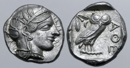 Attica, Athens AR Tetradrachm. Circa 454-404 BC. Head of Athena to right, wearing crested Attic helmet ornamented with three olive leaves above visor ...