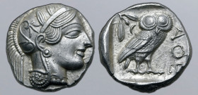 Attica, Athens AR Tetradrachm. Circa 454-404 BC. Head of Athena to right, wearing crested Attic helmet ornamented with three olive leaves above visor ...