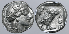 Attica, Athens AR Tetradrachm. Circa 454-404 BC. Head of Athena to right, wearing crested Attic helmet ornamented with three olive leaves above visor ...