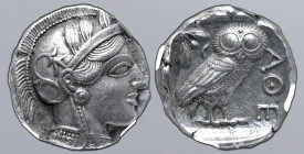 Attica, Athens AR Tetradrachm. Circa 454-404 BC. Head of Athena to right, wearing crested Attic helmet ornamented with three olive leaves above visor ...