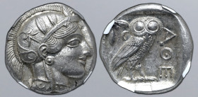 Attica, Athens AR Tetradrachm. Circa 454-404 BC. Head of Athena to right, wearing crested Attic helmet ornamented with three olive leaves above visor ...