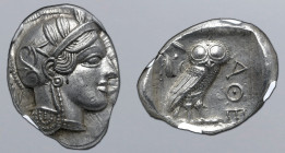 Attica, Athens AR Tetradrachm. Circa 454-404 BC. Head of Athena to right, wearing crested Attic helmet ornamented with three olive leaves above visor ...
