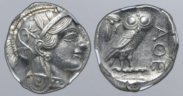 Attica, Athens AR Tetradrachm. Circa 454-404 BC. Head of Athena to right, wearing crested Attic helmet ornamented with three olive leaves above visor ...