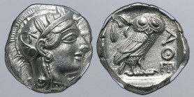 Attica, Athens AR Tetradrachm. Circa 454-404 BC. Head of Athena to right, wearing crested Attic helmet ornamented with three olive leaves above visor ...