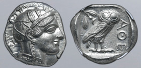 Attica, Athens AR Tetradrachm. Circa 454-404 BC. Head of Athena to right, wearing crested Attic helmet ornamented with three olive leaves above visor ...