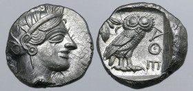 Attica, Athens AR Tetradrachm. Circa 454-404 BC. Head of Athena to right, wearing crested Attic helmet ornamented with three olive leaves above visor ...