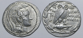 Attica, Athens AR New Style Tetradrachm. Circa 166/5 BC. Timarchos, Nikag(oras), and Lysia- magistrates. Head of Athena Parthenos to right, wearing ne...