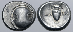Boiotia, Thebes AR Stater. Circa 379-368 BC. Boeotian shield / Amphora; ΔΑ-ΙΜ across fields. BMC 126; BCD Boiotia 523. 12.21g, 23mm. 

Extremely Fine....