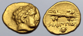 Kingdom of Macedon, Philip II AV 1/12 Stater. Pella, circa 345-336 BC. Laureate head of Apollo to right / ΦIΛIΠΠOY, thunderbolt above, facing lion hea...
