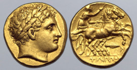 Kingdom of Macedon, Philip II AV Stater. Magnesia, circa 323-315 BC. Laureate head of Apollo to right / Charioteer, holding kentron and reins, driving...