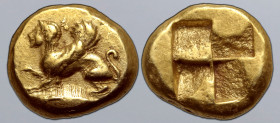 Mysia, Kyzikos EL Hekte. Circa 600-550 BC. Sphinx, with ornamental tendril on her head and with her right fore-paw raised, standing to left, tunny fis...