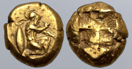 Mysia, Kyzikos EL Stater. Circa 500-450 BC. Warrior, nude but for crested helmet, kneeling to right, bow hanging from arm, testing arrow; tunny fish d...