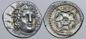 Rhodos, Rhodes AR Drachm. Circa 88 BC - AD 14. Aineas, magistrate. Radiate head of Helios facing slightly to right / Rose of six petals seen from abov...