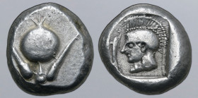 Pamphylia, Side AR Stater. Circa 479-430 BC. Pomegranate on stem with leaf on each side / Helmeted head of Athena to left; dolphin upwards before; all...