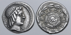 M. Caecilius Q. f. Q. n. Metellus AR Denarius. Rome, 82-80 BC. Head of Apollo to right, hair tied with band; ROMA behind, mark of value below chin / M...