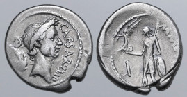 Julius Caesar AR Denarius. Rome, late February 44 BC. M. Mettius, moneyer. CAESAR IMP, laureate head to right; lituus and simpulum behind / M ME[TTIVS...
