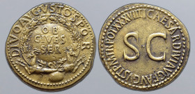 Divus Augustus Ӕ Sestertius. Rome, AD 35-36. DIVO AVGVSTO S P Q R, OB CIVES SER written in three lines on shield, surrounded by oak-wreath and support...