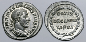 Maximinus I AR Denarius. Rome, AD 236. IMP MAXIMINVS PIVS AVG, laureate, draped and cuirassed bust to right / VOTIS DECENNALIBVS in three lines within...