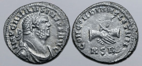 Carausius AR 'Denarius'. Uncertain British mint, AD 286-293. IMP CARAVSIVS P F AVG, laureate and draped bust to right / CONCORDIA MTLITVM (sic), clasp...
