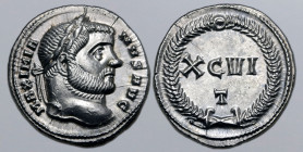 Maximian AR Argenteus. Ticinum, AD 300. MAXIMIANVS AVG, laureate head to right / XCVI T in two lines within wreath. RIC VI 20b; RSC 698. 3.39g, 19mm, ...