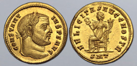 Constantius I AV Aureus. Ticinum, AD 305-306. CONSTANTIVS P F AVG, laureate head to right / FELICITAS AVGG NOSTR, Felicitas seated to left on throne, ...