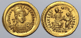 Theodosius II AV Solidus. Constantinople, AD 425. D N THEODOSIVS P F AVG, pearl-diademed, helmeted and cuirassed bust facing slightly to right, holdin...