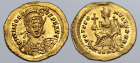 Theodosius II AV Solidus. Constantinople, AD 430-440. D N THEODOSIVS P F AVG, pearl-diademed, helmeted and cuirassed bust facing slightly to right, ho...