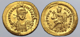 Theodosius II AV Solidus. Constantinople, AD 430-440. D N THEODOSIVS P F AVG, pearl-diademed, helmeted and cuirassed bust facing slightly to right, ho...