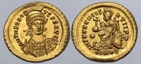 Theodosius II AV Solidus. Constantinople, AD 441-450. D N THEODOSIVS P F AVG, pearl-diademed, helmeted and cuirassed bust facing slightly to right, ho...