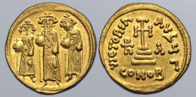 Heraclius, with Heraclius Constantine and Heraclonas, AV Solidus. Constantinople, dated IY 11 = AD 637/8. Heraclius, Heraclonas and Heraclius Constant...
