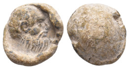 Byzantine Lead Seal. circa 550-650.
Obv. Bearded head (of Saint Paul?) to right
Rev. Uneven hemispherical swelling.
5.35g
15.60m