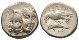 MOESIA, Istros. Dracma. (Ar. 5,63g/17mm). 280-256 a.C. (HGC 3, 1803). Anv: Cabezas laureadas invertidas enfrentadas. Rev: Aguila con delfín a izquierd...
