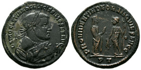 DIOCLECIANO. Follis. (Ae. 8,34g/27mm). 305 d.C. Ticinum. (RIC 57a). Anv: Busto laureado y drapeado de Diocleciano a derecha portando mappa y rama de o...