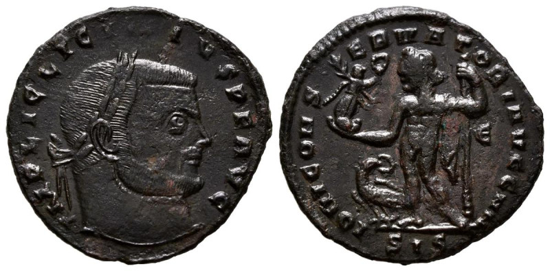 LICINIO I. Follis. (Ae. 3,01g/22mm). 313-315 d.C. Siscia. (RIC 7). Anv: Cabeza l...