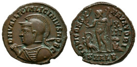 LICINIO II. Follis. (Ae. 3,45g/19mm). 321-324 d.C. Alejandría. (RIC 30). Anv: Busto con casco y coraza de Licinio II a izquierda portando escudo y lan...