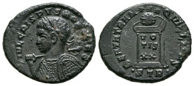 CRISPO. Follis. (Ae. 3,63g/20mm). 322-323 d.C. Trier. (RIC 372). Anv: Busto laureado y con coraza de Crispo a izquierda portando lanza y escudo, alred...
