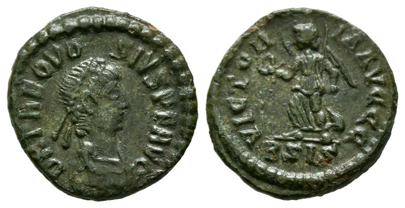 TEODOSIO I. Fracción de Centenional. (Ae. 1,32g/14mm). 384-387 d.C. Siscia. (RIC...